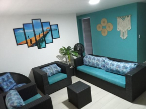 Apartamento Praia Enseada Guarujá Wilma - próximo da praia - com ar condicionado e vaga para carro